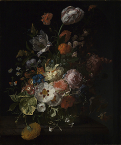 Flowers in a glass vase, on a marble ledge by Rachel Ruysch