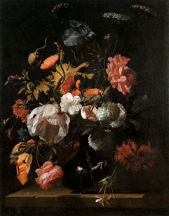 Still life of flowers in a glass vase by Simon Pietersz Verelst