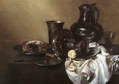 Still Life with Half-eaten Pie by Willem Claeszoon Heda