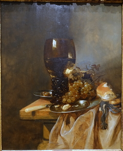 A Roemer with Grapes, a Pewter Plate and a Roll by Abraham van Beijeren