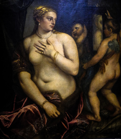 Seated Venus with her Mirror held by Cupid by Titian