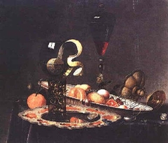 Still life with a lemon in a roemer by Gerard van Berleborch