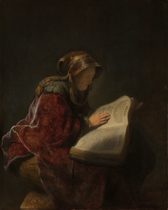 An Old Woman Reading, Probably the Prophetess Hannah by Rembrandt