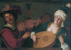 A merry group behind a balustrade with a violin and a lute player by Gerard van Honthorst