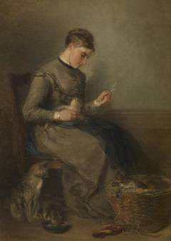 Female Playing with a Cat; an Interior by Anton Burger