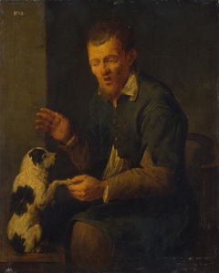 Peasant with a Dog by David Ryckaert III