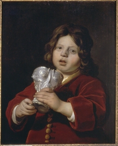 Portrait of a Boy holding a Silver Drinking Cup by Bartholomeus van der Helst