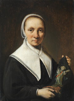 Portrait of a woman holding embroidery (?) by Hendrik Martenszoon Sorgh