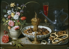 Still life with flowers, goblet and dainties by Clara Peeters