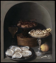 Still Life with Oysters, Sweetmeats and Dried Fruit in a Stone Niche by Osias Beert