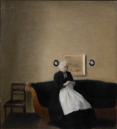 Interior with the Artist's Mother by Vilhelm Hammershøi