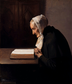 Mrs. Brøndum reading the Bible. by Michael Peter Ancher