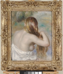 Blonde Braiding Her Hair by Auguste Renoir