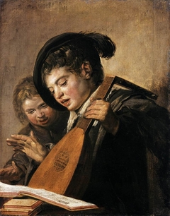 Two singing boys with a lute and a music book by Frans Hals