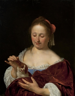 A Woman Pulling a Dog's Ear (Portrait of the Artist's Wife, Cunera van der Cock) by Frans van Mieris the Elder