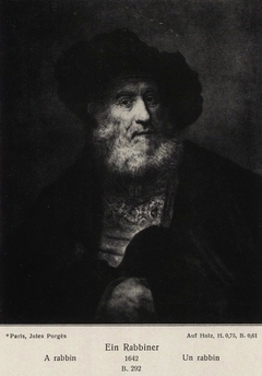 Old man with beard and beret and hand in his cloak by Rembrandt