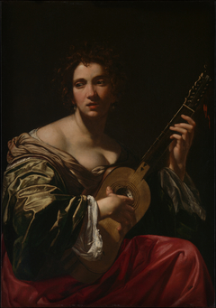 Woman Playing a Guitar by Simon Vouet