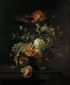 A vase of flowers by Simon Pietersz Verelst