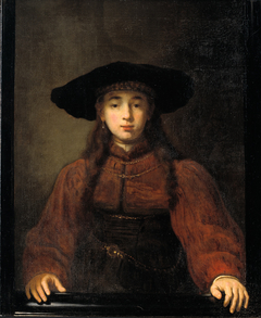 A Young Woman Resting her Hands on the Picture Frame by Rembrandt