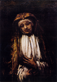 Elderly woman with a rosary by Rembrandt