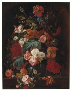 Flowers in a glass vase on a stone slab by Ernst Stuven