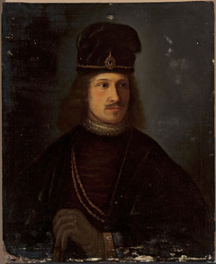 Portrait of a man in a tall cap by Rembrandt