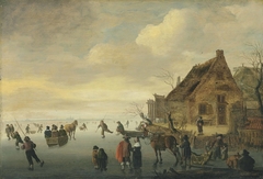 A winter landscape with horse-drawn sledges and figures skating on a frozen lake by a rural village by Cornelis Beelt