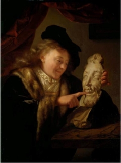 Boy playing with a plaster mask by Godfried Schalcken