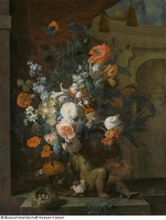 Flower still life with a bird's nest by Coenraet Roepel