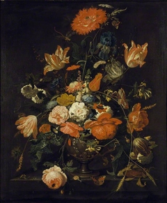 Flowers in an ornamental Vase by Abraham Mignon