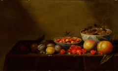 Still life of assorted fruit with two blue-and-white porcelain bowls by Floris van Schooten